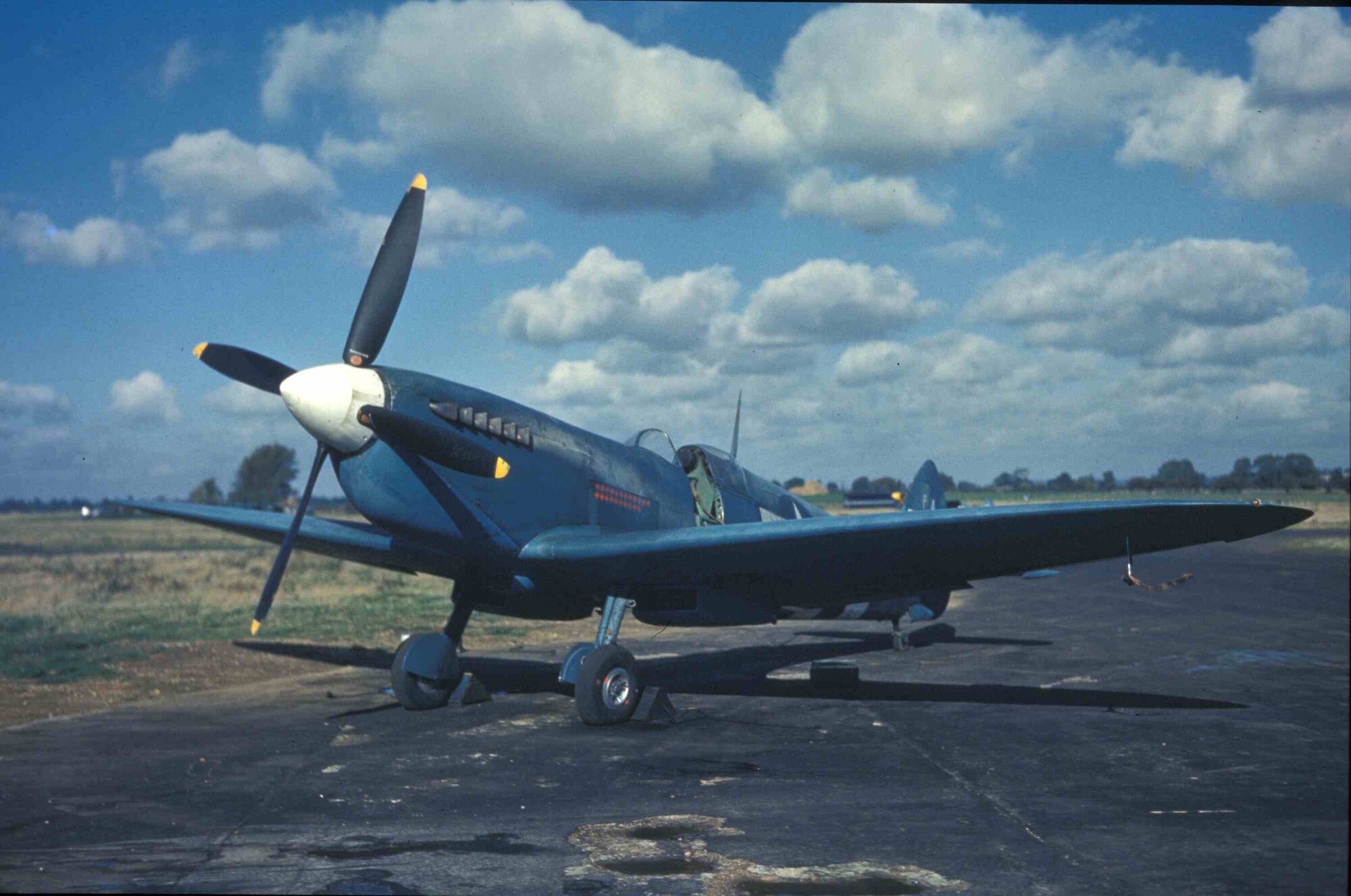A Mark XI Spitfire of the 14th Photographic Reconnaissance Squadron, tail number PA944 assigned to Mount Farm, England, circa 1944.  The Mark XI was a Mark IX Spitfire that had been modified for speed and loiter time.  The Mark XI had its guns and armor removed and replaced with a more powerful engine and larger fuel tank.  Pilots of the Mark XI took to the skies of war-torn Europe without weapons in order to take strategic photographs of German targets.  These photographs allowed allied bombers to strike the most valuable enemy assets.  (U.S. Air Force Photo)