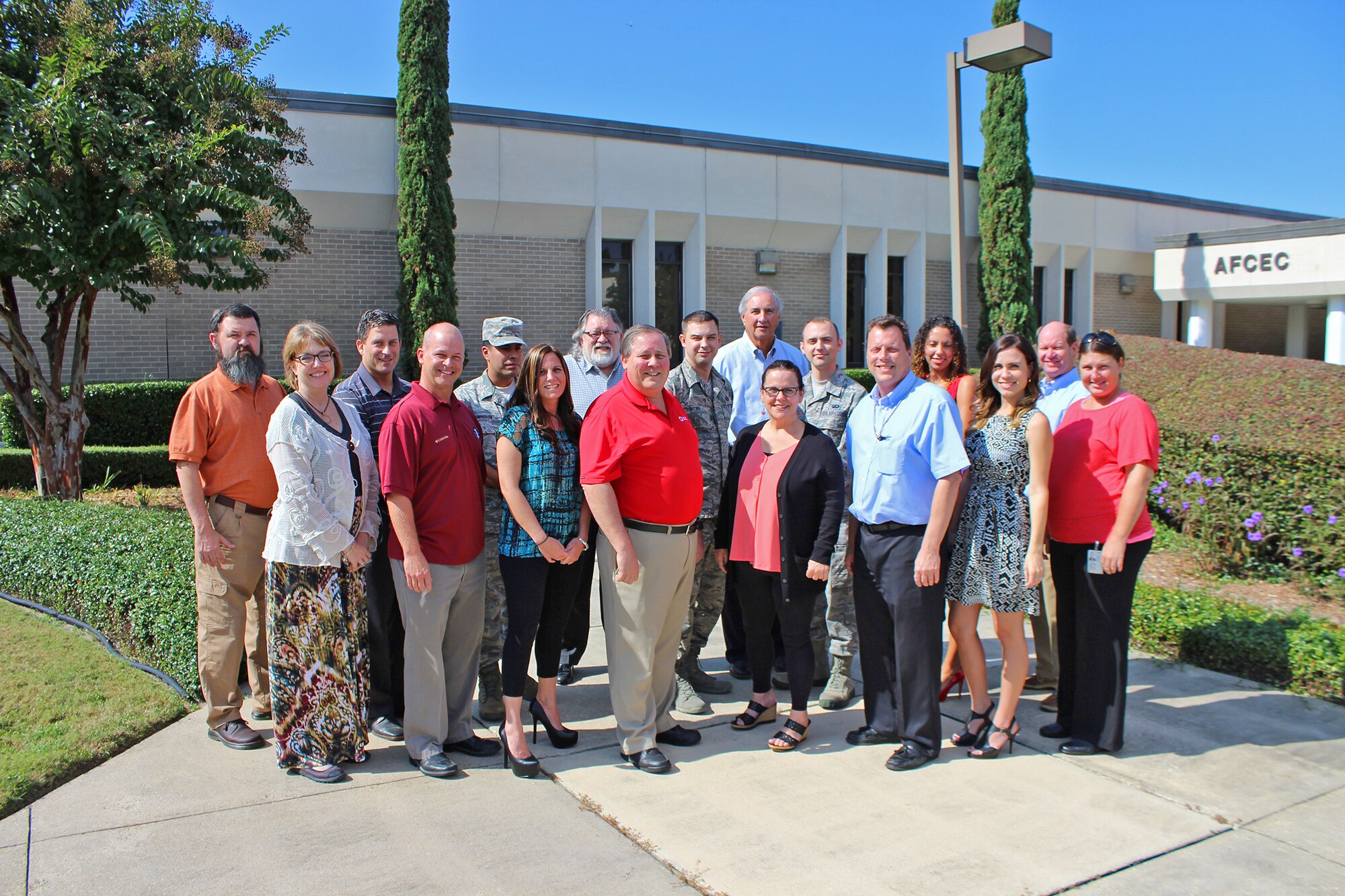 Members of the Air Force Contract Augmentation Program team pose for a group photo. AFCAP is a rapid response contingency contract tool for use by U.S. Government entities needing urgent assistance and was used to get needed supplies to those fighting the Ebola outbreak in several African nations. (U.S. Air Force photo/Released)