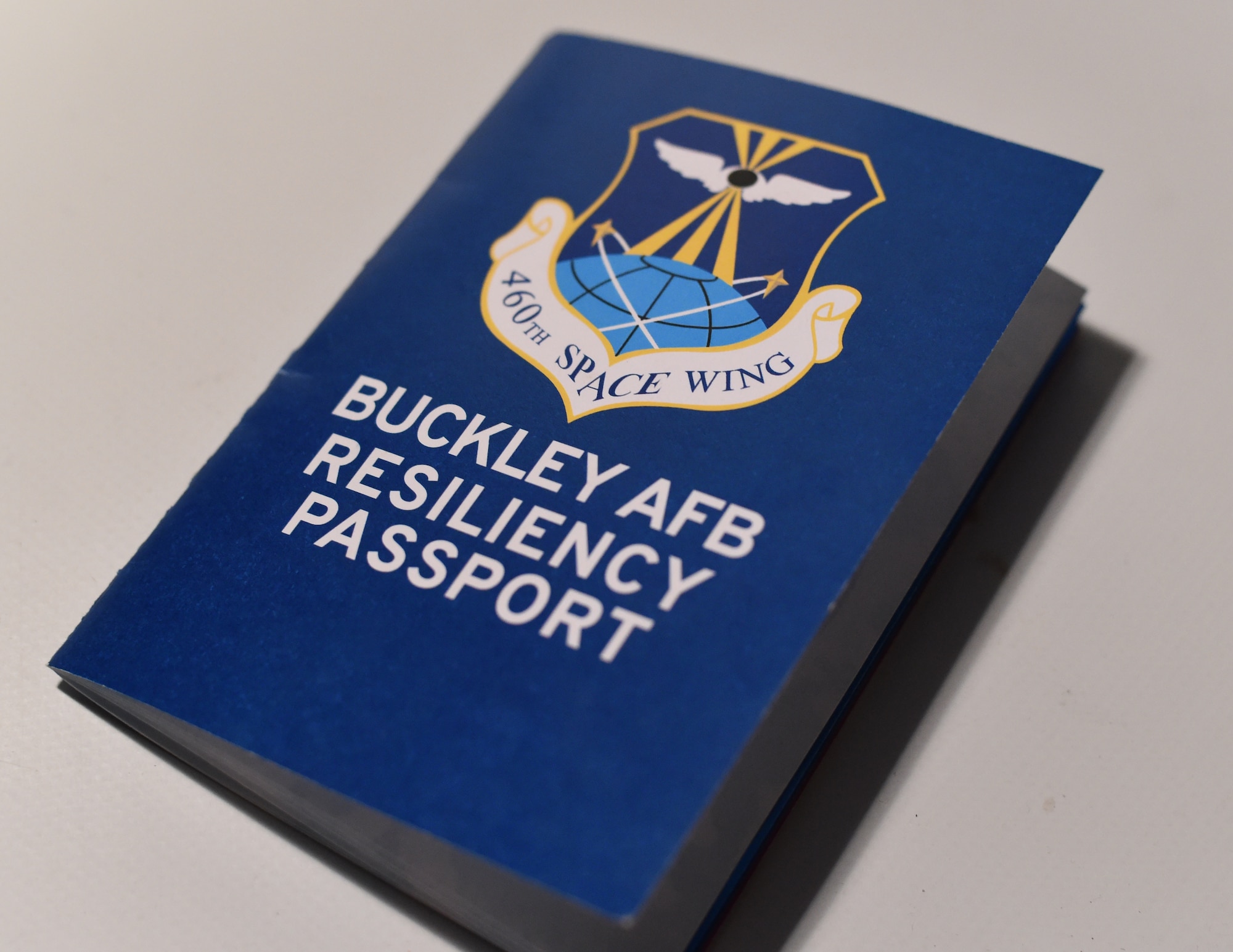 Buckley Air Force Base is distributing ‘Resiliency Passports’ to members of Team Buckley to encourage involvement and participation in base services and programs beginning Nov. 7, 2014, on Buckley AFB, Colo. With a goal to increase Air Force resiliency and life skills, the Resiliency Passport encourages Airmen to attend classes they might not have previously attended. (U.S. Air Force photo by Airman 1st Class Samantha Saulsbury/Released)