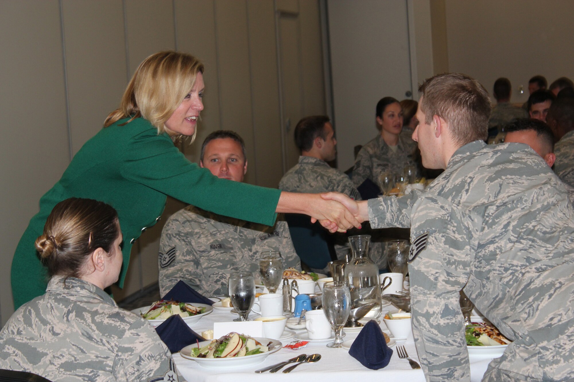 141106-Z-VP586-018 -- Secretary of the Air Force Deborah Lee James shakes hands with Staff Sgt. Kenneth Kirchoff during a lunch at Selfridge Air National Guard Base, Mich., Nov. 6, 2014. Secretary James' visit to Selfridge was her 50th such visit since she became secretary of the Air Force in December 2013. (U.S. Air National photo by Penny Carroll)