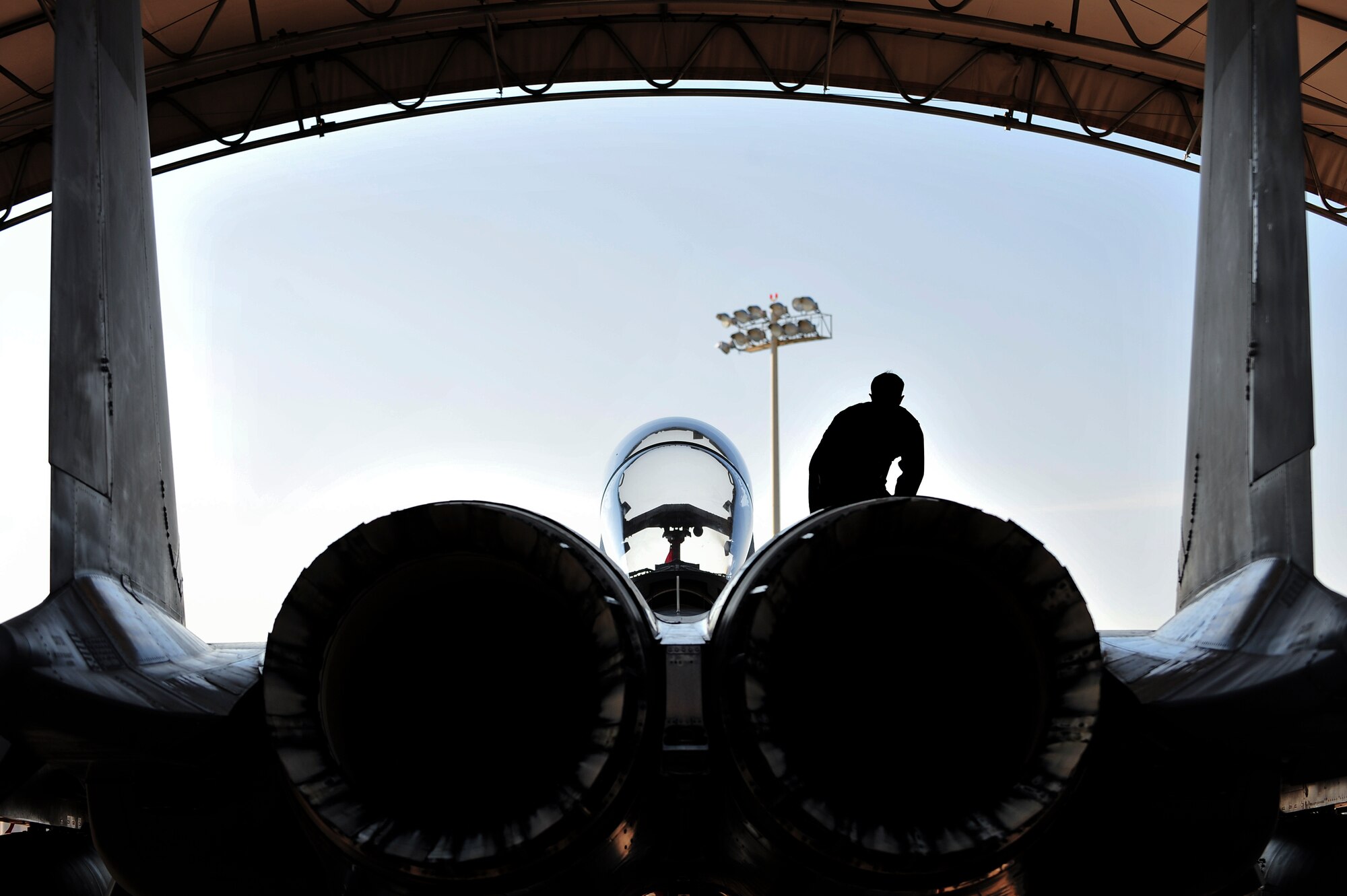 Capt. Erik Spear, 335th Fighter Squadron weapons systems officer, prepares his F-15E Strike Eagle at Seymour Johnson Air Force Base, North Carolina, Oct. 11, 2014, before heading to Nellis Air Force Base, Nevada, in support of the U.S. Air Force Weapons School’s Weapons Instructor Course. Airmen and aircraft assigned to the 4th Fighter Wing out of Seymour Johnson AFB recently returned home from Nellis AFB, where they were tasked with enhancing the F-15E Strike Eagle capability and providing additional air support for the students attending the Weapons School’s Weapons Instructor Course. (U.S. Air Force photo/Senior Airman John Nieves Camacho)