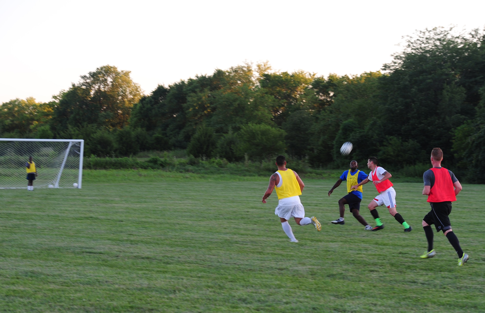 Members of the Sporting Whiteman soccer team participate in a practice session at Cloverdale Complex in Sedalia, Mo., Aug. 12, 2014. The team was preparing for the Defender’s Cup, an Armed Forces soccer tournament, which they scored sixth place in against 36 other teams. (U.S. Air Force photo by Staff Sgt. Nick Wilson/Released)
