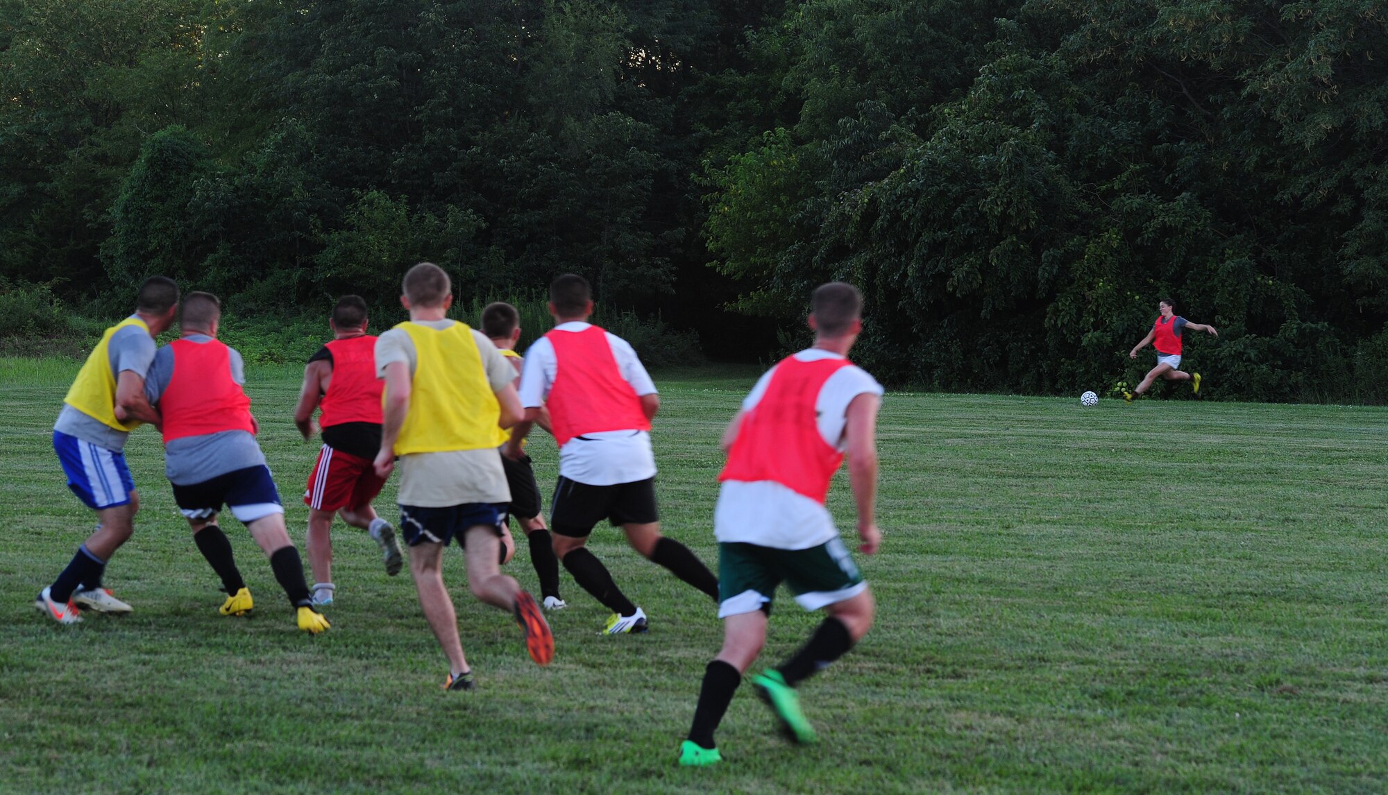 Emily Jordan, Sporting Whiteman soccer team member, kicks the ball inbounds during a practice session at Cloverdale Complex in Sedalia, Mo., Aug. 12, 2014. The team was preparing for the Defender’s Cup, an Armed Forces soccer tournament, which they scored sixth place in against 36 other teams. (U.S. Air Force photo by Staff Sgt. Nick Wilson/Released)