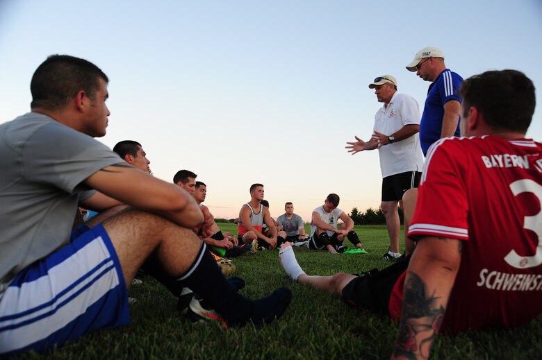 Roy Dietzman, Sporting Whiteman soccer team head coach, mentors players on the importance of playing aggressively after a scrimmage scheduled for Labor Day at Cloverdale Complex in Sedalia, Mo., Aug. 12, 2014. The team was preparing for the Defender’s Cup, an Armed Forces soccer tournament, which they scored sixth place in against 36 other teams. (U.S. Air Force photo by Staff Sgt. Nick Wilson/Released)