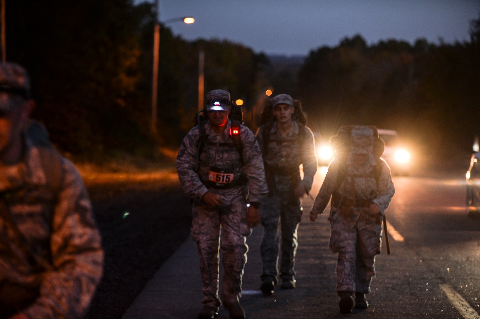 Airmen compete to earn the Norwegian Foot March badge Oct. 31, 2014, at Little Rock Air Force Base, Ark. Although 30 participants started the journey to achieve the badge only 20 finished in the allotted time to earn it. (U.S. Air Force photo by Senior Airman Cliffton Dolezal)