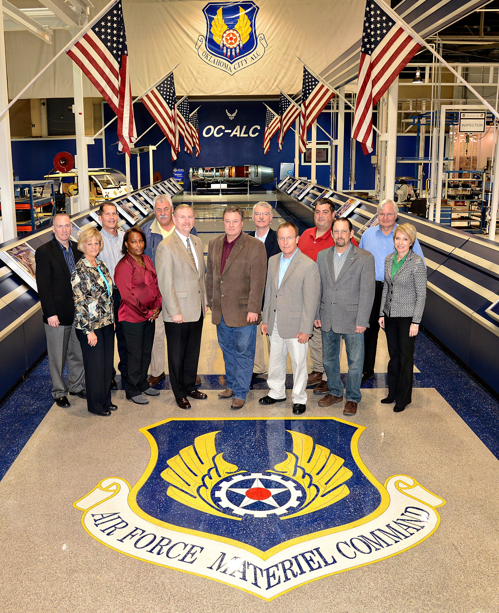 Air Force Materiel Command and American Federation of Government Employees
Council 214 met at Tinker Air Force Base for a Partnership Council meeting
Oct. 30-31. The purpose of the Partnership Council is to foster a culture of
cooperation by involving the union early in the process as a way to jointly
work issues and reach solutions. Council members in attendance are, from
left, Dr. Todd Fore (AFMC/A1), Patsy Reeves (AFLCMC/CA), Randy Shaw
(AFMC/A1KL), Pamela McGinnis (AFGEL-1138), Rocky Tasse (AFGEL-1942), Michael
Gill (AFMC/CA), Troy Tingey (AFGE Council 214), David Robertson (AFTC/CA),
Jeff Allen (AFSC/CA), Ty Norton (AFGE C214), Monty Lewis (AFGE L-1592), Tom
Robinson (AFGE C214) and Gina Martinelli (AFMC/A1KL). (Air Force photo by
Kelly White)
