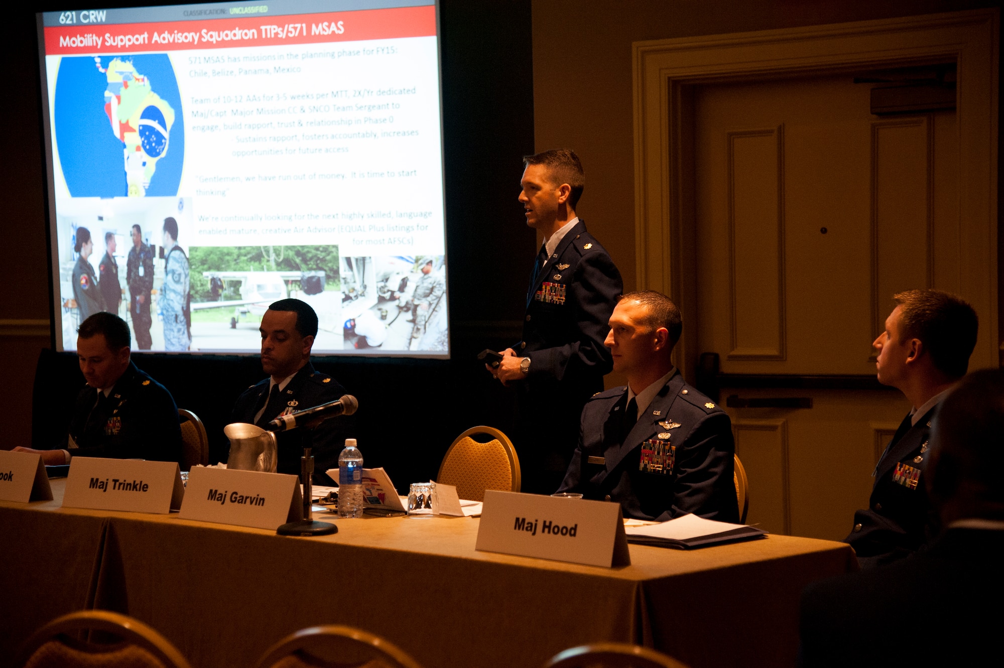 JOINT BASE MCGUIRE-DIX-LAKEHURST, N.J. – Maj. Bryan Trinkle, 571st Mobility Support Advisory Squadron, speaks during one of the seminars hosted by 621st Contingency Response Wing leadership, during the 46th Annual Air Mobility Command’s Airlift/Tanker Association Symposium and Technological Exposition held Oct. 29 - Nov 3. ATA facilitated in-person collaboration for the CRW and allowed the team to discuss the future of the CRW. The CRW operates between two coasts to increase range and response capability requiring unique communication and problem solving. (U.S. Air Force photo/Staff Sgt. Destinie Berry/RELEASED)