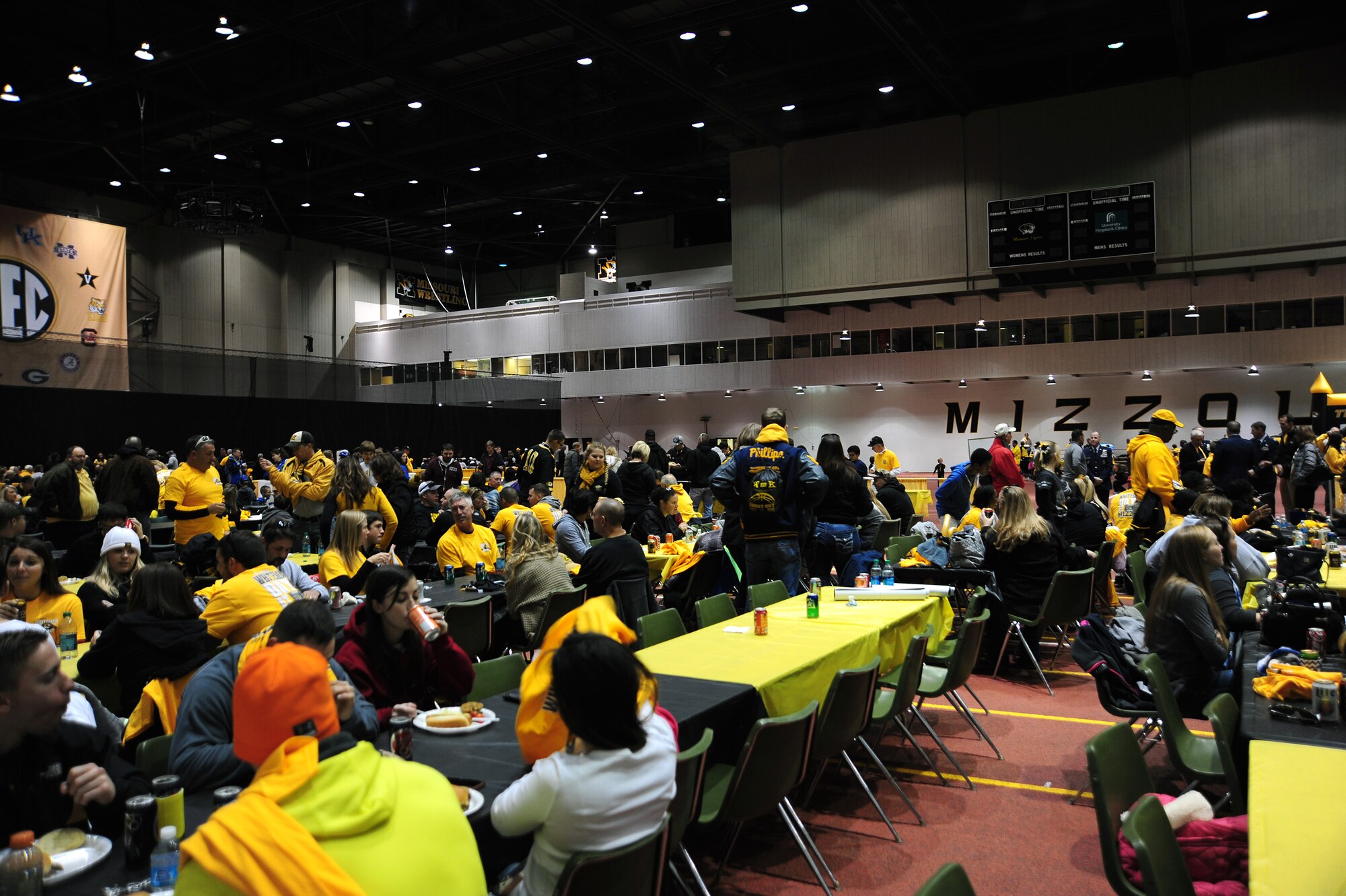 Members from Team Whiteman participate in a free tailgate party at the University of Missouri in Columbia, Mo., Nov. 1, 2014. The Airmen and their families received food, drinks and commemorative military appreciation day T-shirts. (U.S. Air Force photo by Maj. John Severns/Released)