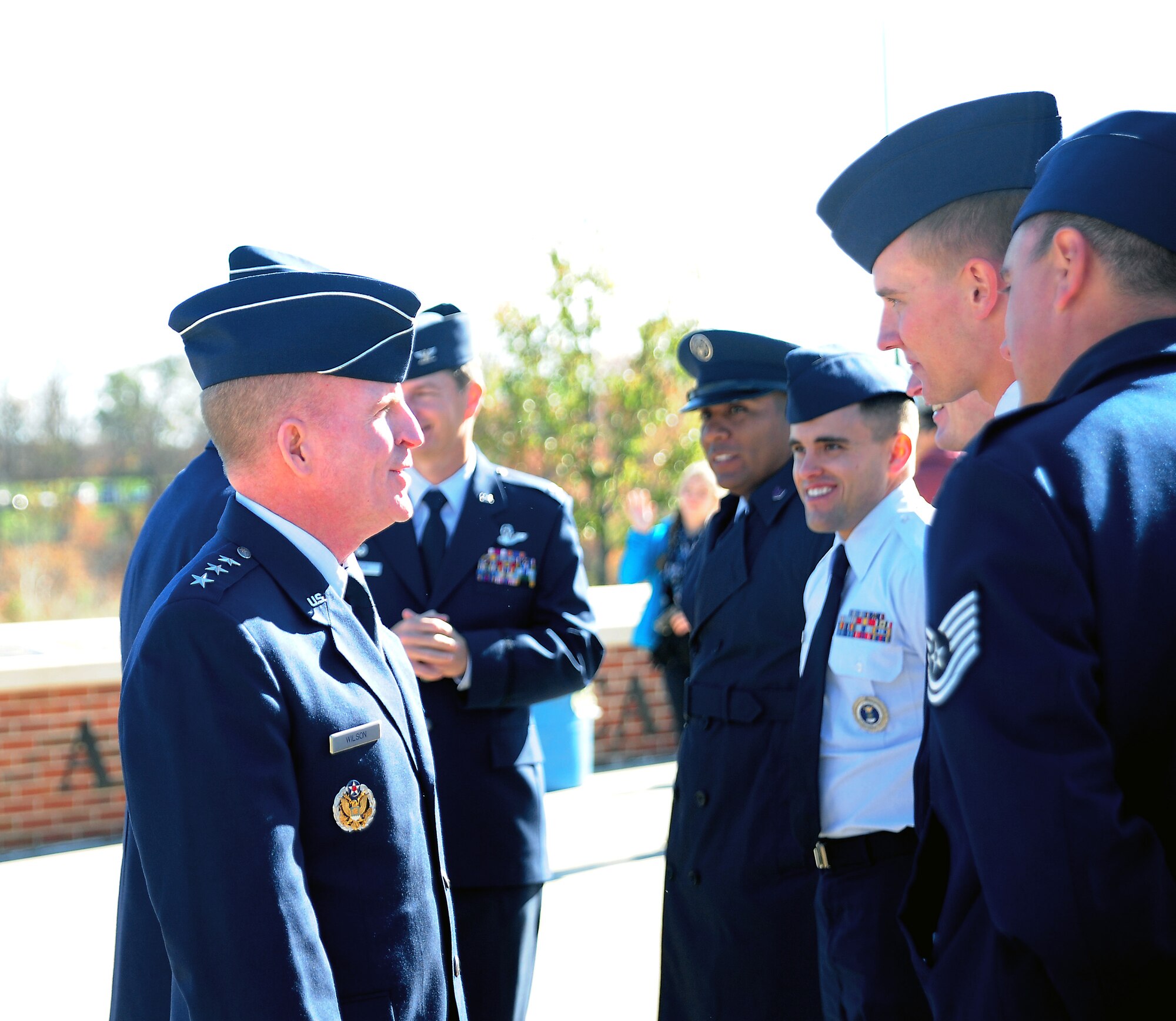 Lt. Gen. Stephen Wilson, Air Force Global Strike Command commander, speaks with Airmen from Whiteman Air Force Base, Mo., during the University of Missouri’s military appreciation game in Columbia, Mo., Nov. 1, 2014. Airmen from Whiteman AFB were recognized during the pre-game ceremony.
(U.S. Air Force photo by Maj. John Severns/Released)
