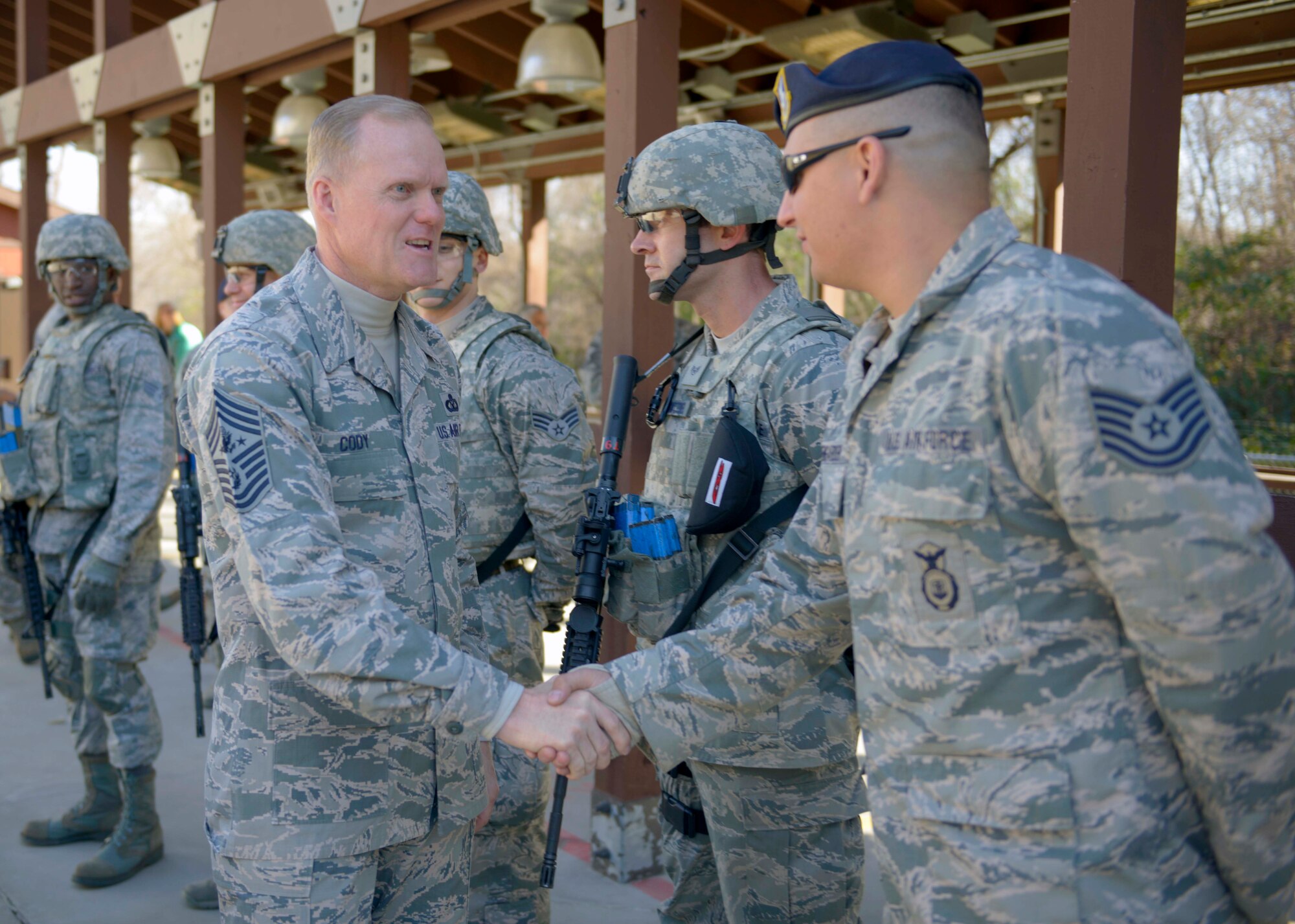 Chief Master Sgt. of the Air Force James A. Cody meets Airmen from the 934th Security Forces Squadron at the 934th Airlift Wing firing range Nov. 2. (Air Force Photo/Paul Zadach)