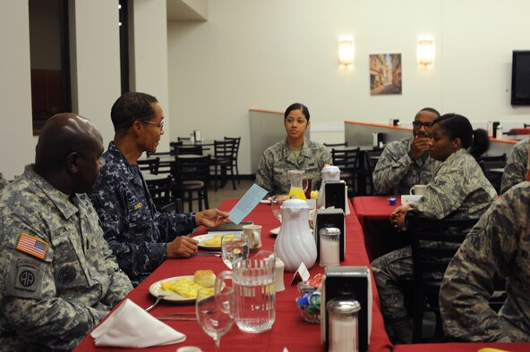 U.S. Navy Adm. Cecil Haney, U.S. Strategic Command commander, and U.S. Army Command Sgt. Maj. Patrick Alston, the senior enlisted leader for USSTRATCOM, speak to Airmen during breakfast at Whiteman Air Force Base, Mo., Oct. 31, 2014. Adm. Haney is responsible for the global command and control of U.S. strategic forces to meet decisive national security objectives. USSTRATCOM provides a broad range of strategic capabilities and options for the President and Secretary of Defense. (U.S. Air Force photo by Airman 1st Class Jovan Banks/Released)
