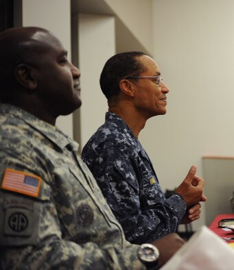U.S. Navy Adm. Cecil Haney, U.S. Strategic Command commander, and U.S. Army Command Sgt. Maj. Patrick Alston, the senior enlisted leader for USSTRATCOM, speak to Airmen during breakfast at Whiteman Air Force Base, Mo., Oct. 31, 2014. Haney and Alston asked Airmen about their concerns and ideas for improving working and living conditions and stressed the importance of their contributions to the nuclear deterrence mission. (U.S. Air Force photo by Airman 1st Class Jovan Banks/Released)