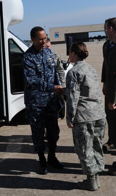 U.S. Navy Admiral Cecil Haney, U.S. Strategic Command commander, and U.S. Air Force Master Sgt. Melanie Simmons, 509th Operations Support Squadron, shake hands during a visit to Whiteman Air Force Base, Mo., Oct. 30, 2014. The 509th Bomb Wing supports USSTRATCOM's strategic deterrence mission by operating and maintaining B-2 Spirit bombers to deter strategic threats from adversaries and assuring allies of STRATCOM’s commitment to their security. (U.S. Air Force photo by Airman 1st Class Joel Pfiester/Released).