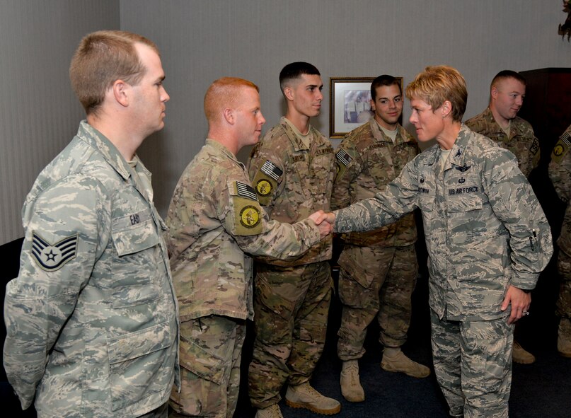 Col. Kristin Goodwin, 2nd Bomb Wing commander, welcomed Airmen home from a six month deployment on Barksdale Air Force Base, La., Nov. 5, 2014. Goodwin greeted members of the team individually during a reception. (U.S. Air Force photo/Airman 1st Class Mozer O. Da Cunha)