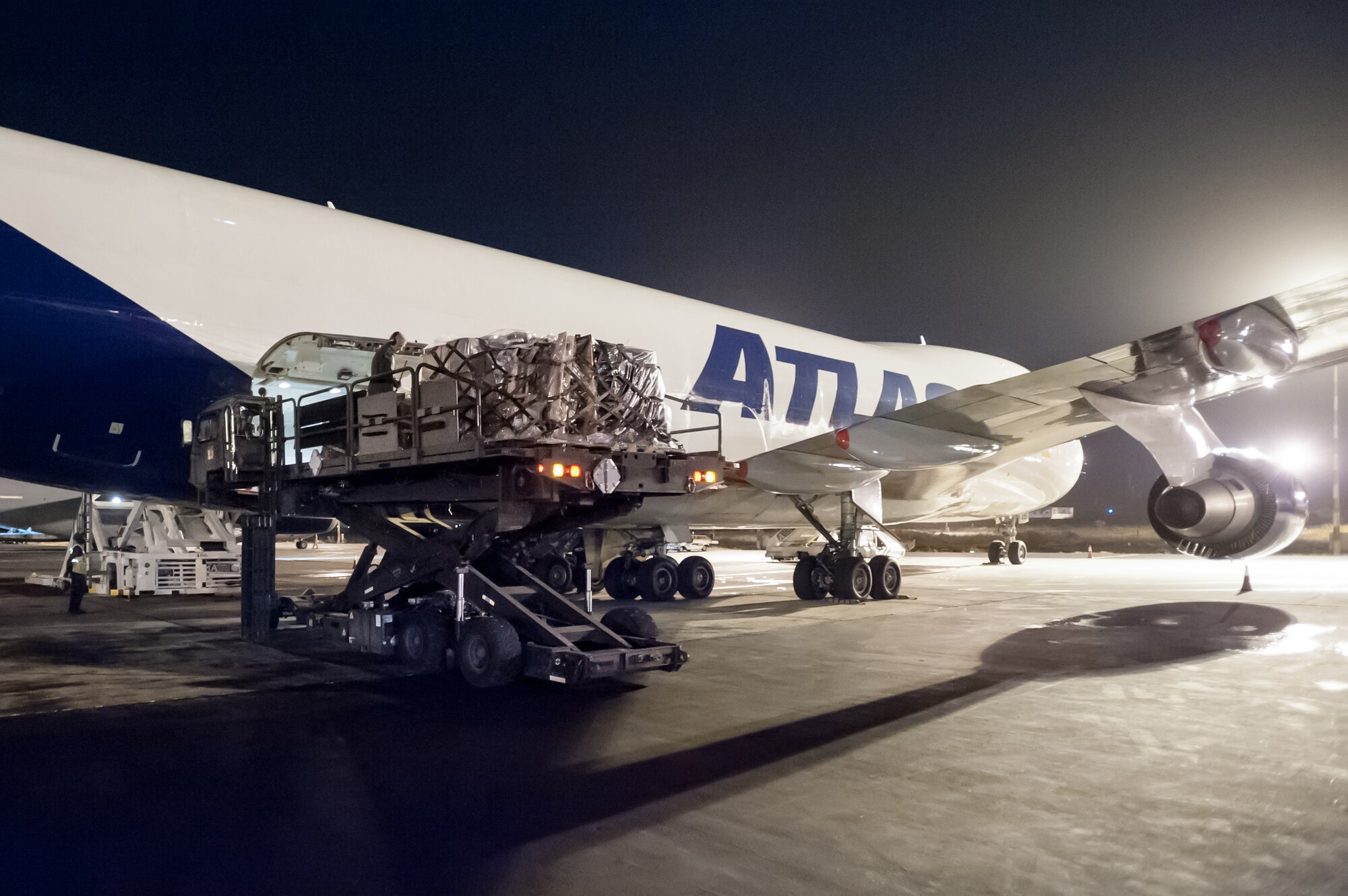 Aerial porters from Kentucky Air National Guard’s 123rd Contingency Response Group off-load 85 tons of humanitarian aid from a 747 cargo plane at Léopold Sédar Senghor International Airport in Dakar, Senegal, Nov. 2, 2014. The cargo, which includes medical supplies and troop-support equipment, will be staged in a nearby cargo yard before being airlifted to Liberia aboard U.S. Air Force C-130s in support of Operation United Assistance, the U.S. Agency for International Development-led, whole-of-government effort to contain the Ebola virus outbreak in West Africa. (U.S. Air National Guard photo by Maj. Dale Greer)