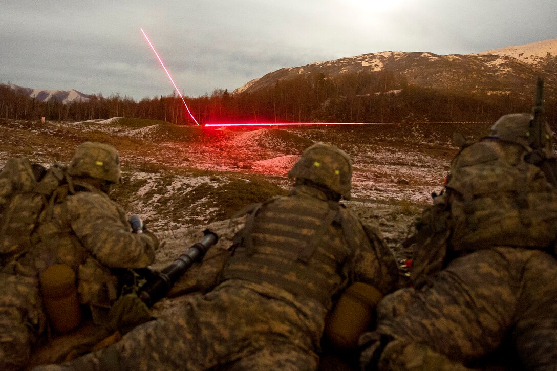 Soldiers prepare to fire a 60 mm mortar during a live-fire exercise on Joint Base Elmendorf-Richardson, Alaska, Nov. 4, 2014. The soldiers are mortarmen assigned to the 25th Infantry Division's Company C, 1st Battalion Airborne, 501st Infantry Regiment, 4th Infantry Brigade Combat Team Airborne, Alaska.