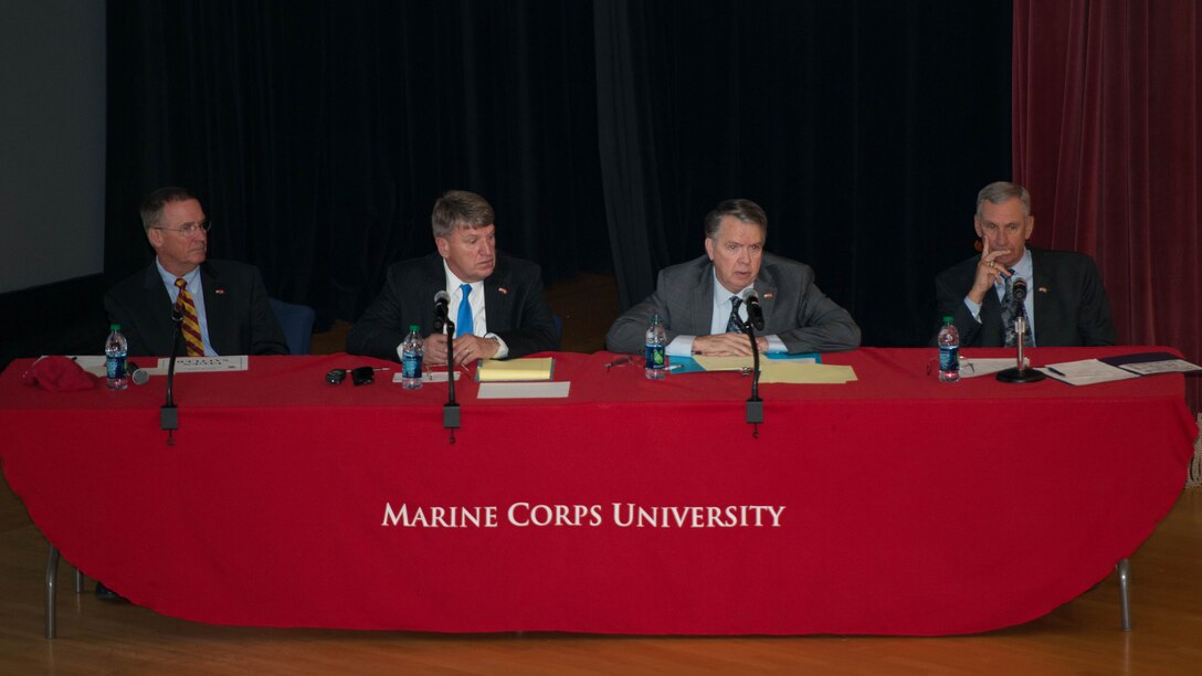 Retired Marine Lt. Gen. John F. Sattler, Commanding General of I MEF from September 2004 to August 2005, retired Marine Lt. Gen. Richard F. Natonski, Commanding General of 1st Marine Division from August 2004 to August 2006, retired Marine Lt. Gen. Keith J. Stalder, Commanding General of 3rd Marine Aircraft Wing from May 2004 to August 2005 and retired Marine Lt. Gen. Richard S. Kramlich, Commanding General of 1st Force Service Support Group from June 2003 to August 2005 participate in The General Graves B. Erskine Distinguished Lecture Series at Marine Corps Base Quantico, Va., on October 30, 2014. The leaders of Operation al-Fajr shared their experiences in a panel discussion with service members of all ranks and some from different countries.