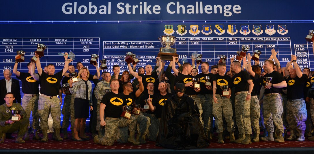 The total-force team of the 509th Bomb Wing and the 131st Bomb Wing wins the Fairchild Trophy for best bomb wing in the Air Force Nov. 5, 2014, at the 2014 Global Strike Challenge (GSC) score posting, hosted at Barksdale Air Force Base, La. After months of fierce competition, the ‘best of the best’ were named among GSC teams around Air Force Global Strike Command, Air Combat Command, Air Force Reserve Command the Air National Guard. The 509th BW and the 131st BW are based at Whiteman AFB, Mo. (U.S. Air Force photo/Senior Airman Benjamin Gonsier)
