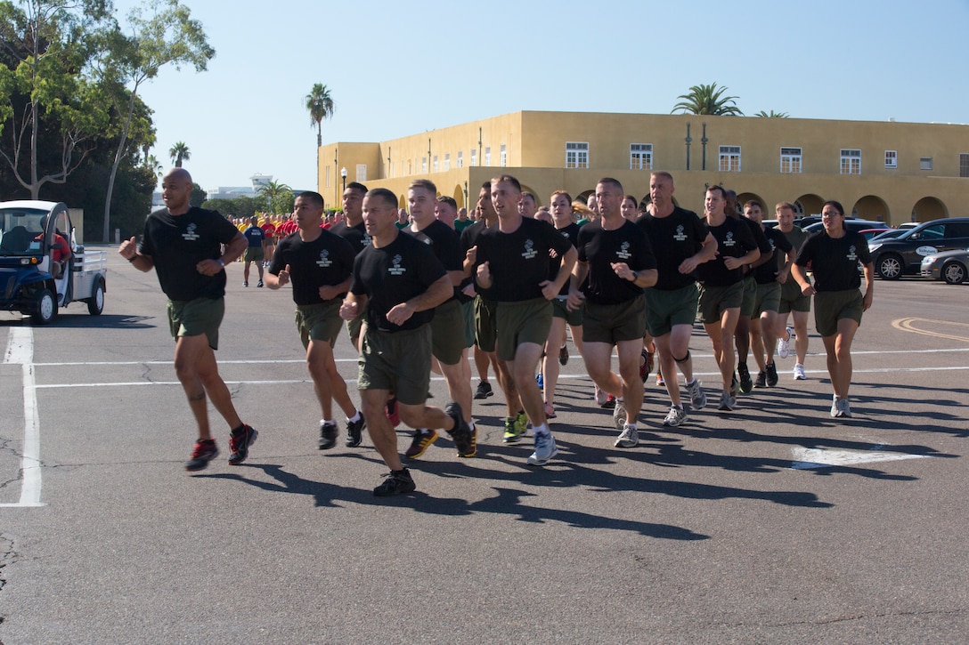 Marines with 12th Marine Corps District run in formation during the Commanding General’s three-mile motivational run on Marine Corps Recruit Depot San Diego Nov. 6, 2014. The run is to pay tribute to the 239 years of the United States Marine Corps’ service in the defense of our nation. 