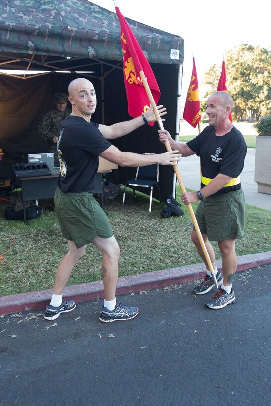 Marines with 12th Marine Corps District run in formation during the Commanding General’s three-mile motivational run on Marine Corps Recruit Depot San Diego Nov. 6, 2014. The run is to pay tribute to the 239 years of the United States Marine Corps’ service in the defense of our nation. 