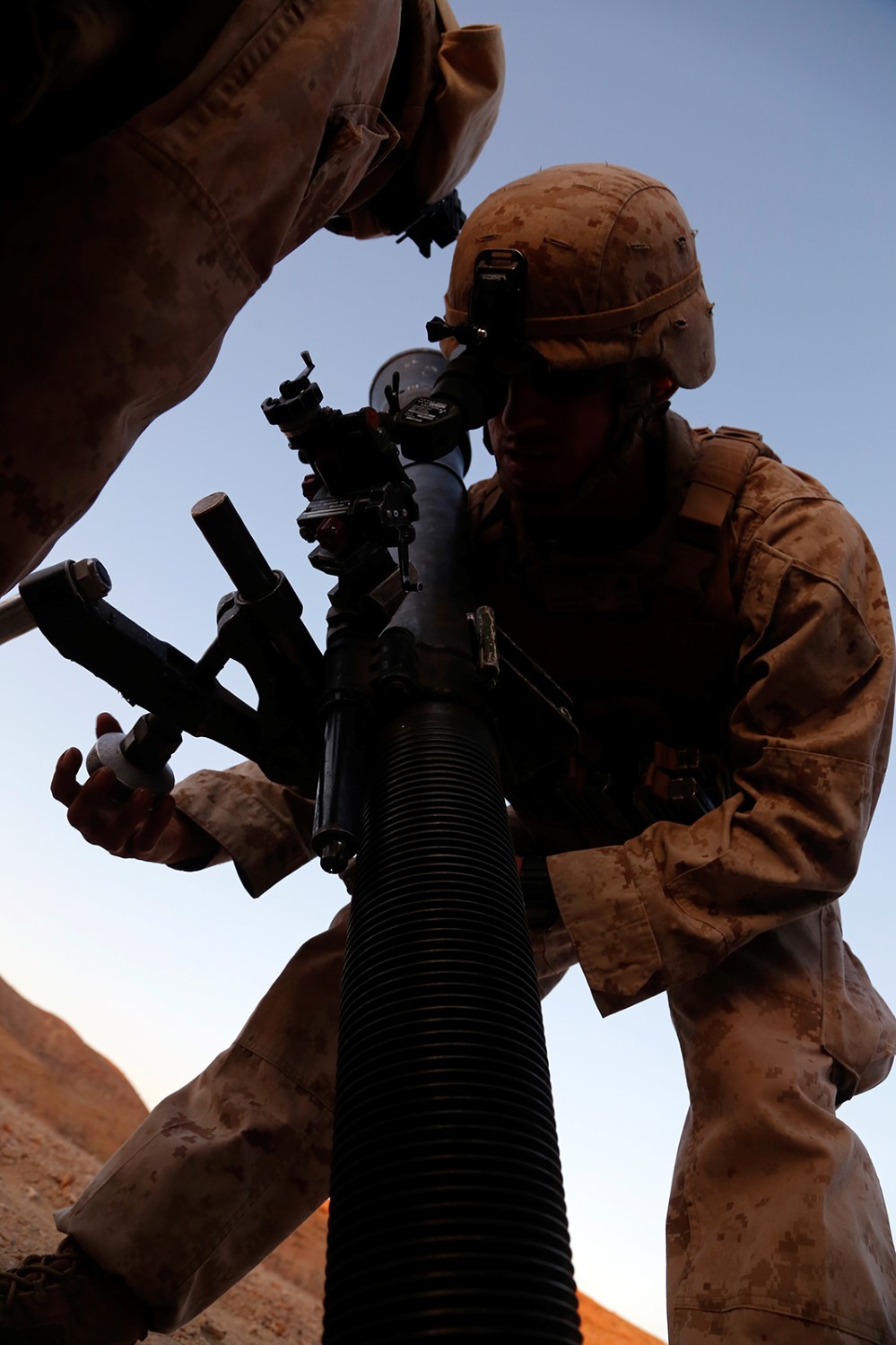 U.S. Marine Corps Lance Cpl. Forrest K. Guerra, a mortarman with Weapons Company, Battalion Landing Team 2nd Battalion, 1st Marines, 11th Marine Expeditionary Unit (MEU), sites in an M253 81mm mortar system during a live-fire exercise as part of sustainment training at D’Arta Plage, Djibouti, Nov. 5. Marines from the 11th MEU are deployed as a flexible, adaptable and persistent force in the U.S. 5th Fleet area of responsibility. (U.S. Marine Corps photos by Gunnery Sgt. Rome M. Lazarus/Released)