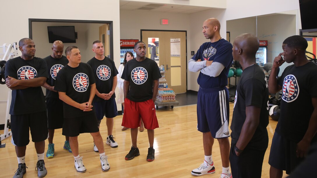 Monty Williams, New Orleans Pelicans head coach, speaks to Marines from Marine Forces Reserve during a practice session at the Pelicans’ practice facility in Metairie, La., Nov. 6, 2014. The Marines had an opportunity to practice with the players, tour the facility and eat lunch at the Pelicans’ cafeteria for NBA Cares Hoops for Troops Week.