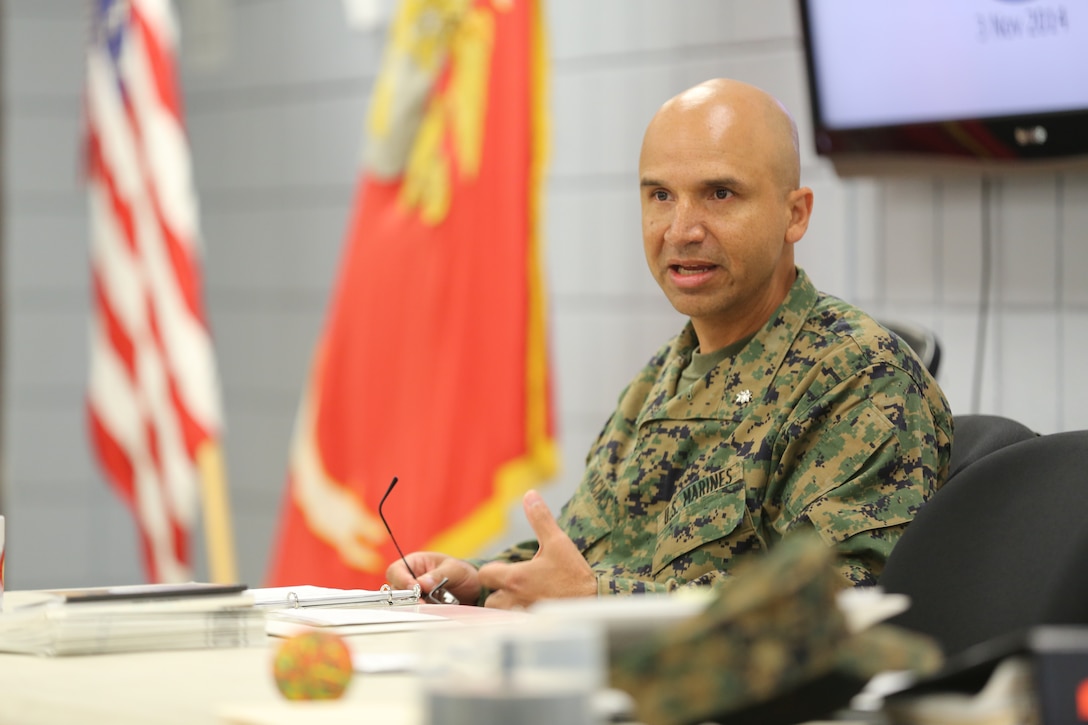 Lt. Col. Jaime Macias explains the importance of leadership during a Lance Corporal Leadership and Ethics Seminar at Marine Corps Air Station Cherry Point, N.C., Nov. 3, 2014. During the seminar, lance corporals from Marine Wing Communications Squadron 28 learned about core values, leadership and ethos. Lance corporals across the Corps must complete a command-sponsored leadership and ethics seminar before being considered eligible for the rank of corporal. Macias is the commanding officer of MWCS-28 and native of Queens, New York. 