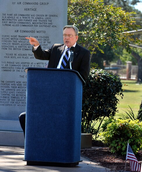 Dale Hill, chaplain for the Forward Air Controller Association, speaks about the history of FACs during a memorial ceremony at the Air Park on Hurlburt Field, Fla., Oct. 25, 2014. Nearly 300 former Forward Air Controllers, their families and friends, and Hurlburt Airmen paid tribute to those who lost their lives in past wars. (U.S. Air Force photo/Senior Airman Kentavist P. Brackin)