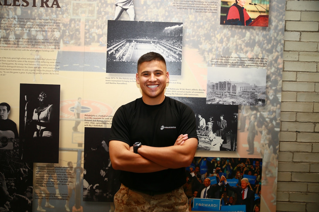 PHILADELPHIA—,Sgt. Nelson Andrade with Recruiting Station Harrisburg attends the National Wrestling Coaches Association in the hopes of spreading more information to attendees about the Marine Corps in Philadelphia, Nov. 1, 2014. Andrade and other Marines were on hand at the event to show support to the participants and answer questions about the Marine Corps. 