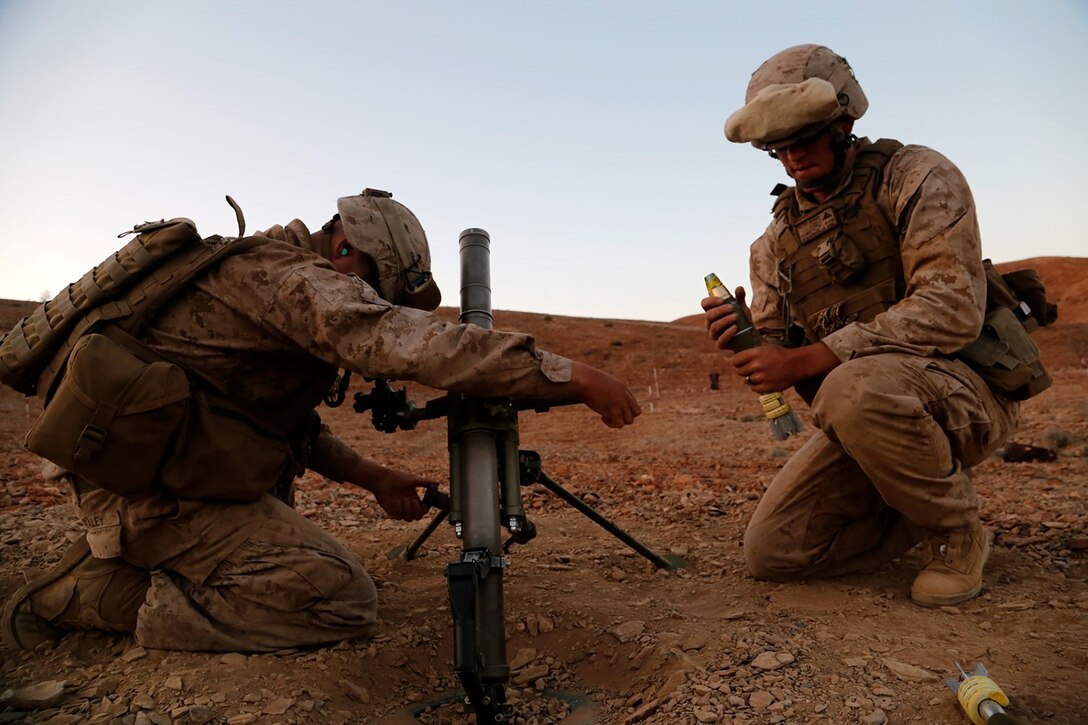 U.S. Marines with Fox Company, Battalion Landing Team 2nd Battalion, 1st Marines, 11th Marine Expeditionary Unit (MEU), launch high explosive mortar rounds during a live-fire exercise as part of sustainment training at D’Arta Plage, Djibouti, Nov. 5. The 11th MEU is deployed as a theater reserve and crisis response force throughout U.S. Central Command and the U.S. 5th Fleet area of responsibility. (U.S. Marine Corps photos by Gunnery Sgt. Rome M. Lazarus/Released)