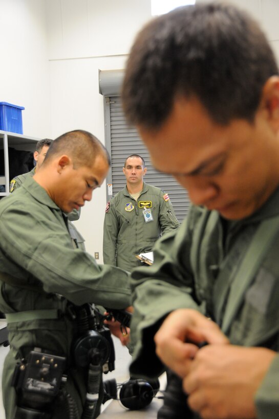 U.S. Air Force Capt. Joshua C. Ishiki, 203rd Air Refueling Squadron, Hawaii Air National Guard, oversee a Chemical, Biological, Radiological, Nuclear and Explosives (CBRNE) Exercise at Joint Base Pearl Harbor Hickam, Hawaii on Nov. 7, 2014. Ishiki is part of a Wing Inspection Team assembled to execute the Commander's Inspection Program (CCIP), within the updated Air Force Inspection System. (U.S. Air National Guard photo by Airman 1st Class Robert Cabuco)