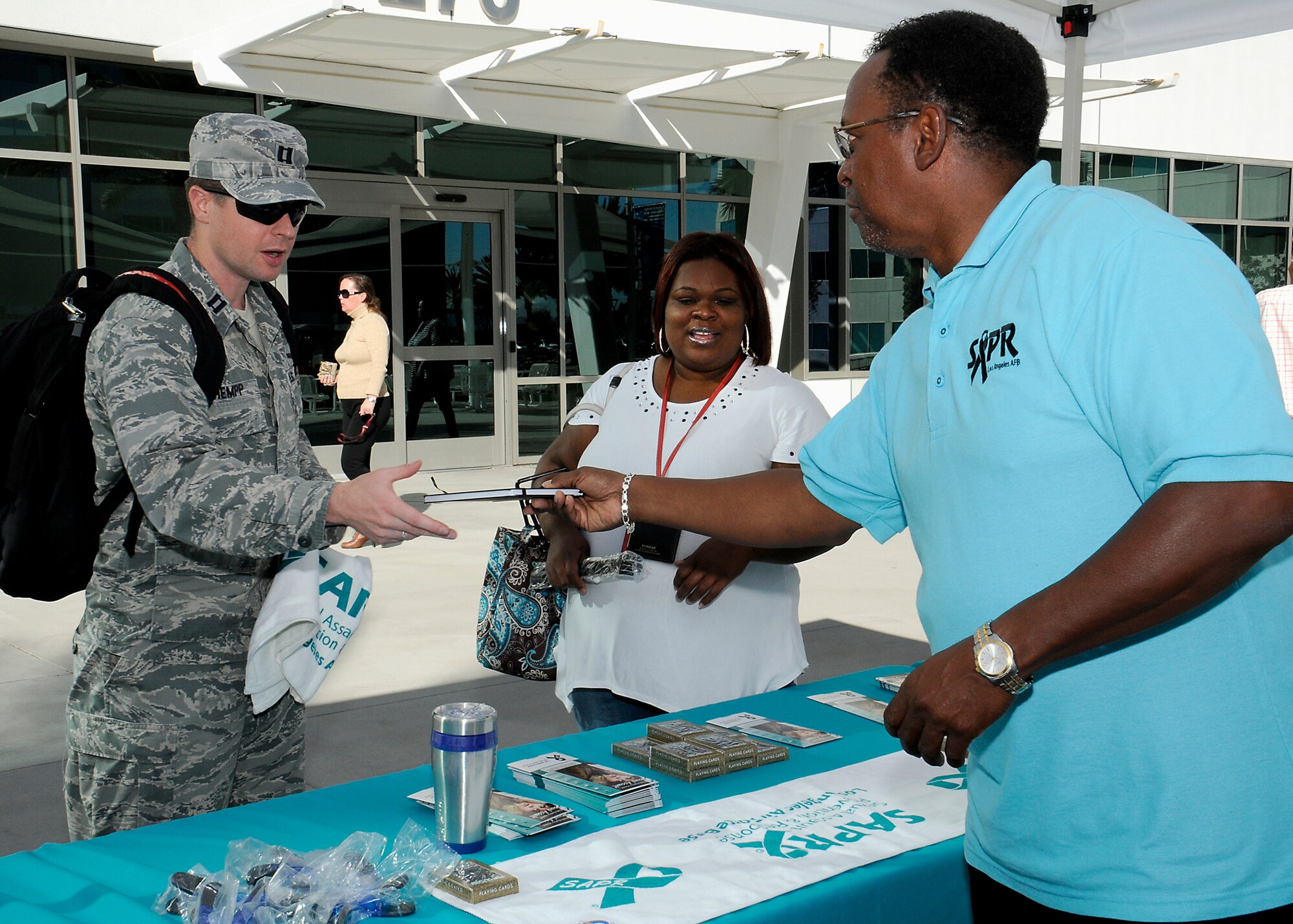 Los Angeles Air Force Base members visit informational booths during the
Fall 2014 Wingman Day, Nov. 6.  Wingman Day events begin with Wingman
University, a set of activities and classes designed to build individual resilience skills and empower military and civilian Airmen to develop a healthier lifestyle through the CAF philosophy, followed by unit wingmen activities.    (Photo by Joe Juarez)  
