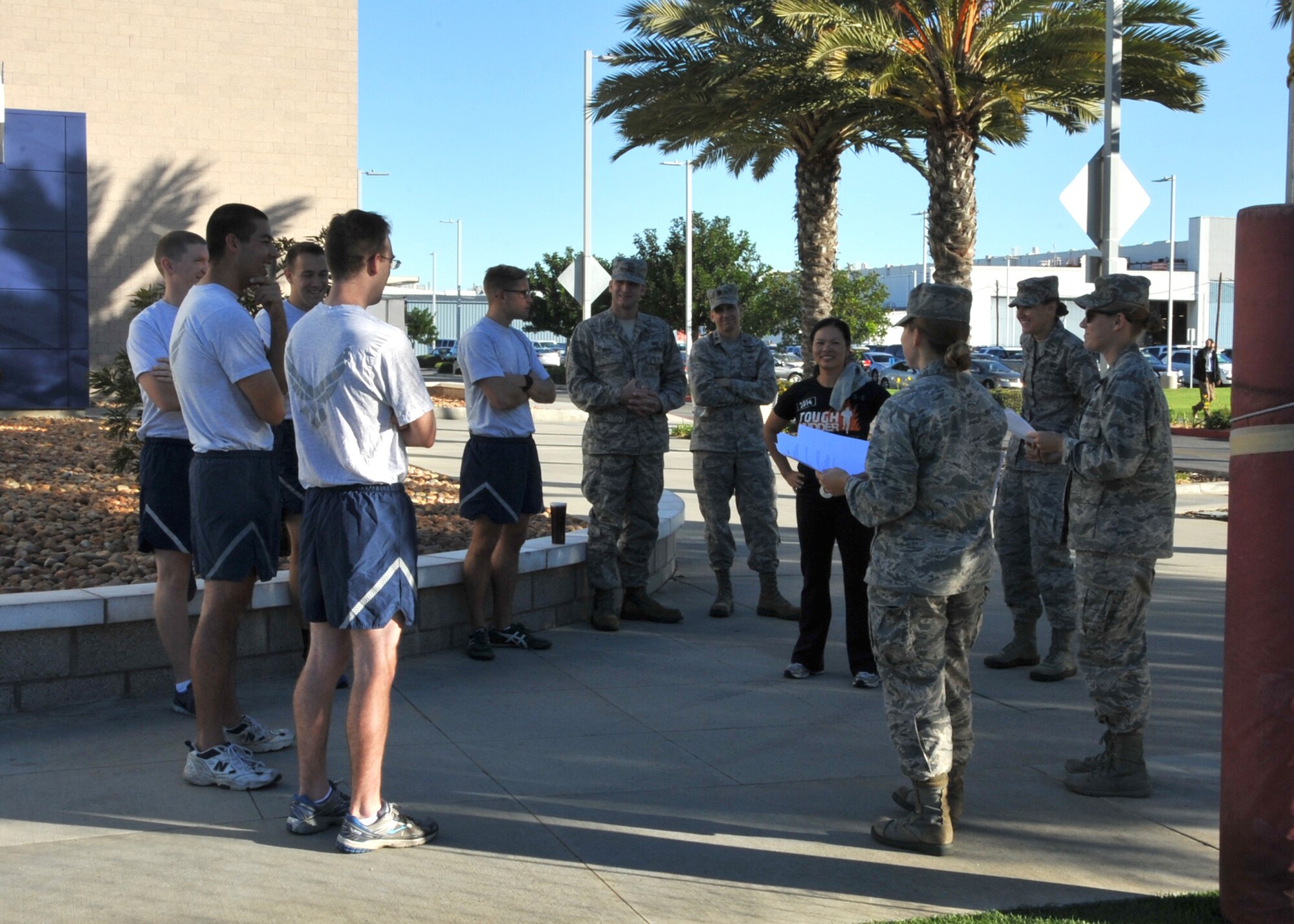 Los Angeles Air Force Base members participate in a scavenger hunt based on
the Comprehensive Airmen Fitness philosophy during the Fall 2014 Wingman Day, Nov. 6.  Wingman Day events begin with Wingman University, a set of activities and classes designed to build individual resilience skills and empower military and civilian Airmen to develop a healthier lifestyle through the CAF philosophy, followed by unit wingmen activities.    (Photo by Sarah Corrice)  
