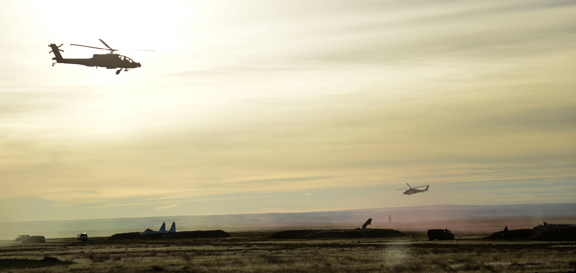 U.S. Forces work together during a simulated joint force training event at Saylor Creek Range, Idaho, Nov. 5, 2014. Marines and Airmen worked with Army pilots during the training event. (U.S. Air Force photo by Airman 1st Class Malissa Lott/RELEASED)
