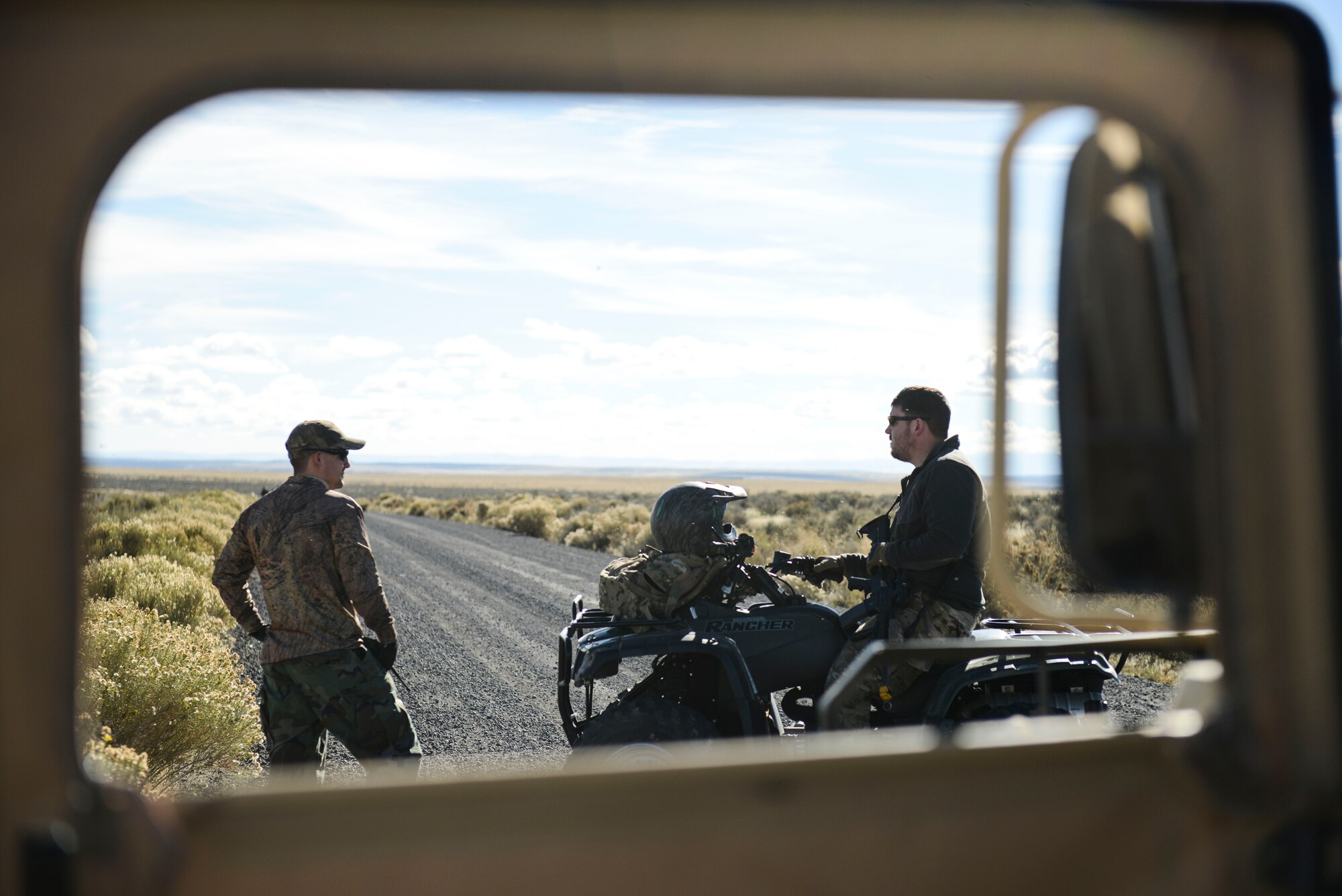 Airmen discuss operations before a simulated air strike during the Capstone Training Event at Saylor Creek Range, Idaho, Nov. 5, 2014. Teams Red and Blue worked as opposing forces during the training event to give the most realistic experience. (U.S. Air Force photo by Airman 1st Class Malissa Lott/RELEASED
