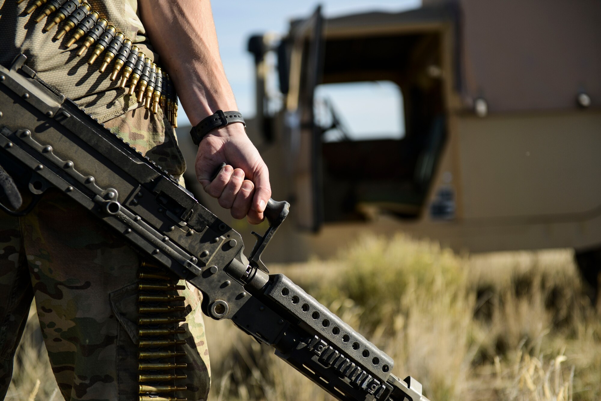 An Airman carries a weapon during simulated joint force maneuvers for the Capstone Training Event at Saylor Creek Range, Idaho, Nov. 5, 2014. The event included multiple groups from Mountain Home Air Force Base, as well as Gowen Field and the Marines Corps. (U.S. Air Force photo by Airman 1st Class Malissa Lott/RELEASED)