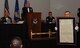 Fulfilling his role as Sergeant-at-Arms, Chief Master Sgt. Thomas Mazzone shows the audience an official proclamation before presenting it to Lt. Gen. James Kowalski, deputy commander of U.S. Strategic Command, at Air Force Global Strike Command’s inaugural Order of the Sword induction ceremony at Barksdale Air Force Base, La., Nov. 6, 2014. Kowalski, who served as commander of AFGSC from Jan. 2011 to Oct. 2013, was chosen by the enlisted corps to become the first inductee of the Order for his significant contributions to the welfare and prestige of the Air Force enlisted force and mission effectiveness. (U.S. Air Force photo by Airman 1st Class Joseph Raatz/Released)