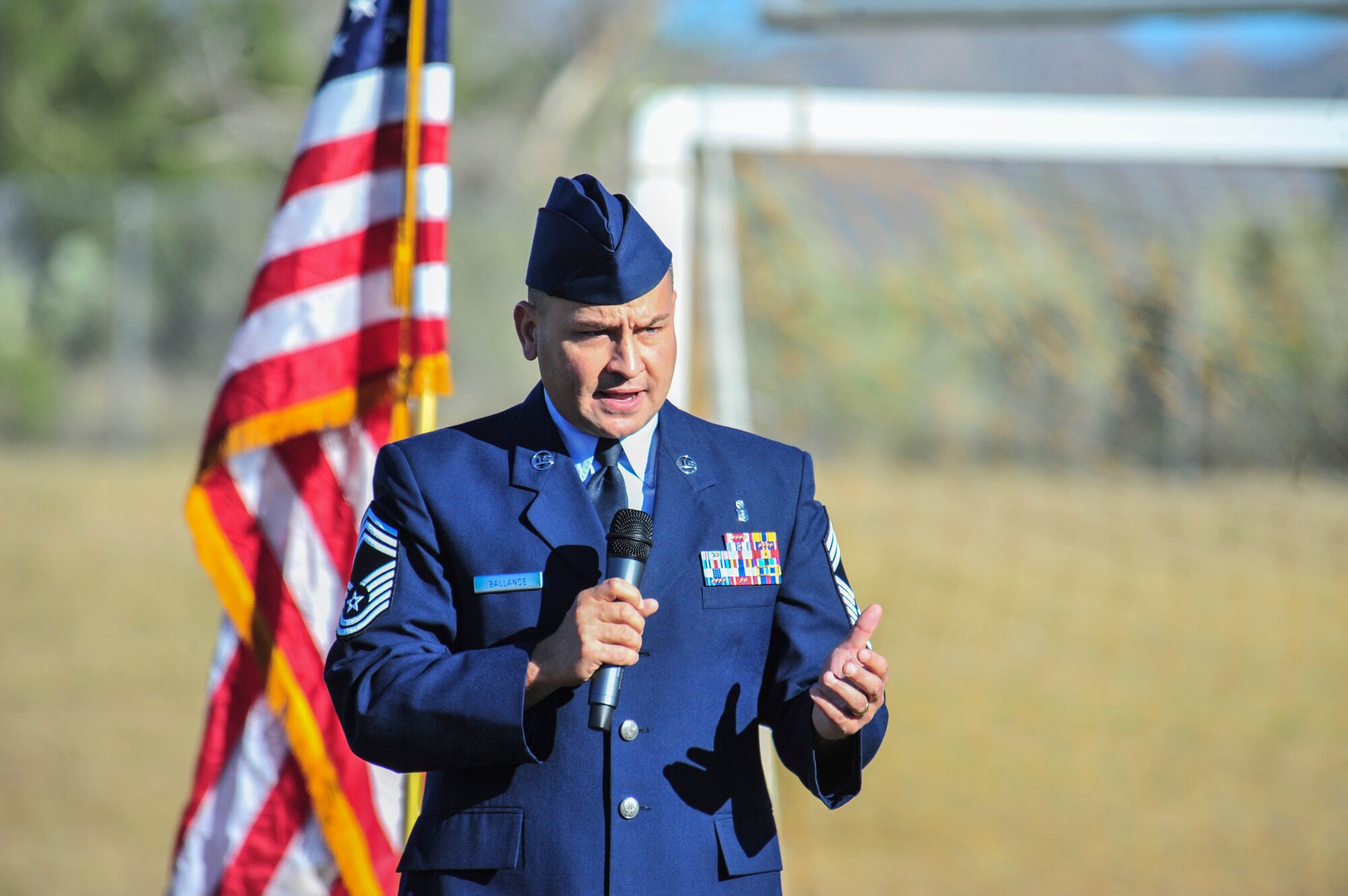 U.S. Air Force Chief Master Sgt. Chad Ballance, 355th Medical Group superintendent, speaks during a Veterans Day Assembly at Richard B. Wilson K-8 School, Tucson, Ariz., Nov. 7, 2014.  Ballance spoke about veterans who paid the ultimate sacrifice to protect the safety and freedoms of the U.S.  (U.S. Air Force Photo by Airman 1st Class Chris Massey/Released)