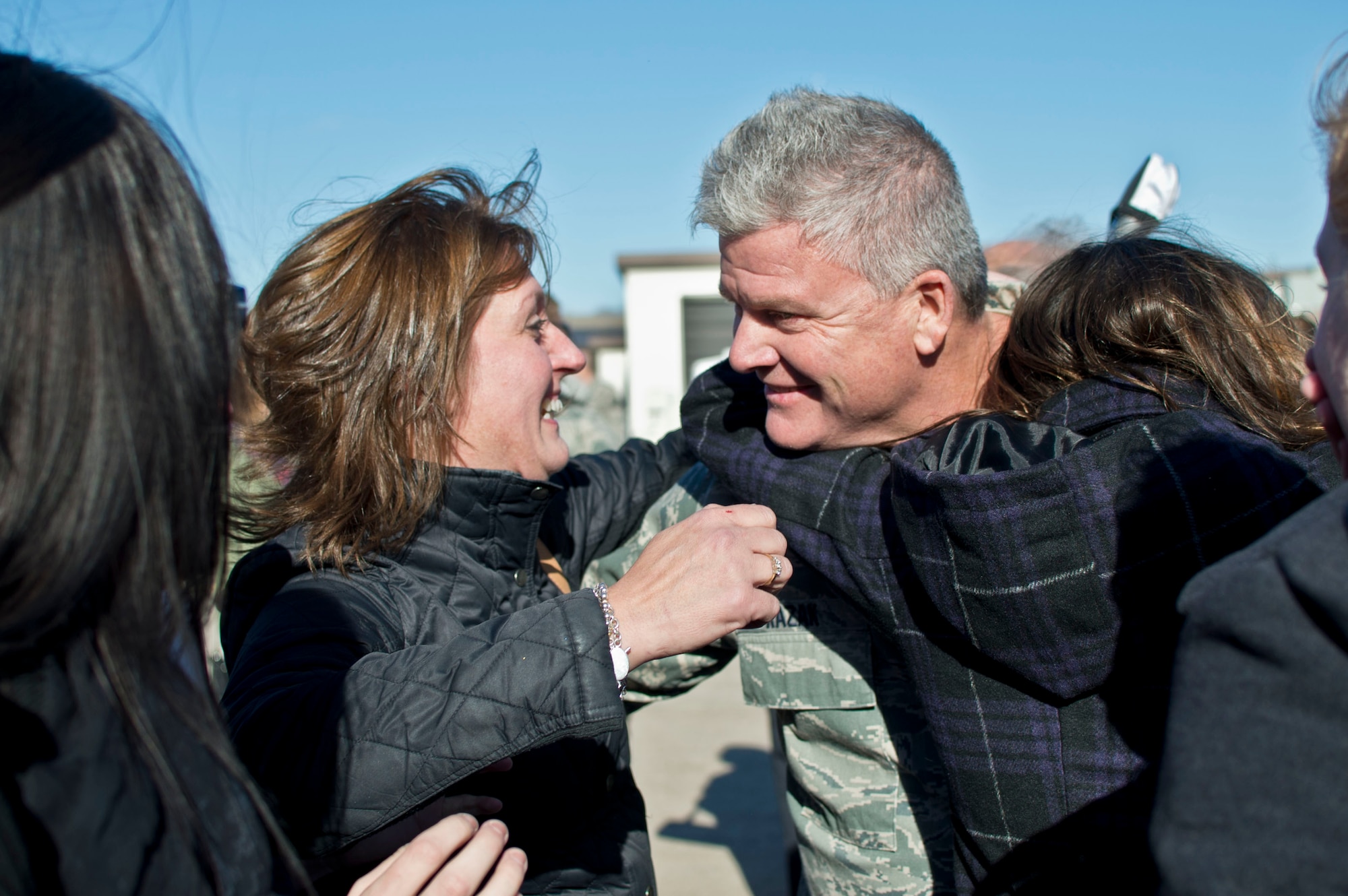 U.S. Air Force airmen from the 133rd Airlift Wing reunite with their families and friends in St. Paul, Minn., Nov. 5, 2014.  Nearly 100 airmen from the 133rd Airlift Wing were deployed to Southeast Asia for four months in support of Operation Enduring Freedom.  (U.S. Air National Guard photo by Tech. Sgt. Lynette R. Olivares/Released)