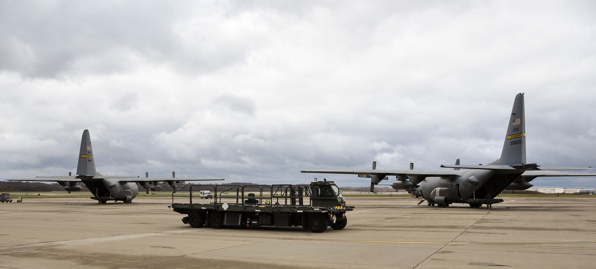 A 25K loader taxis across the flight line of the Pittsburgh International Airport Air Reserve Station during a flight generation exercise, Nov. 1, 2014. The flight generation exercise was held to make sure that all involved Aircrew personnel are in fighting shape to handle any mission that is required of them anywhere in the world. (U.S. Air Force photo by Senior Airman Joseph E. Bridge)