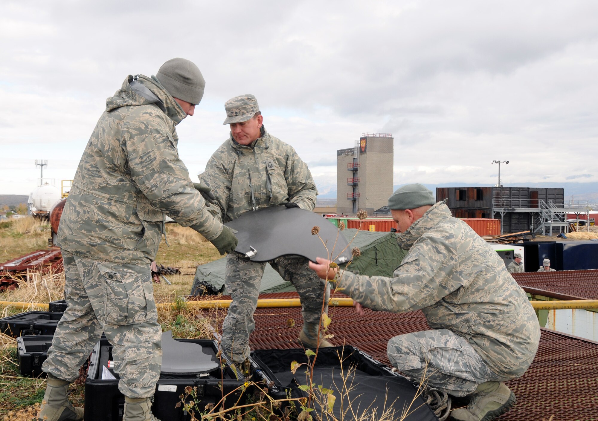 Members of the 151st Communications Flight set up satellite communications at the Magna, Utah rubble pile on November 3, 2014 during the Vigilant Guard training exercise. (Air National Guard photo by Staff Sgt. Annie Edwards/RELEASED)