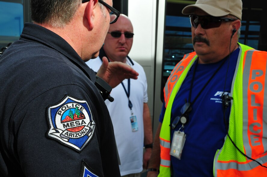 Phoenix Sky Harbor International airport held its triennial exercise, Phoenix, Oct. 30, 2014. The Federal Aviation Administration requires airports like Phoenix Sky Harbor to conduct a full-scale emergency exercise once every three years. This exercise not only satisfied that federal requirement, it also allowed the 161st Air Refueling Wing, the Phoenix Aviation Department, Phoenix Fire, police from the Phoenix valley, FBI, NTSB, and Homeland Security to exercise unified command procedures and provide hands-on training. The exercise simulated an aircraft emergency crash landing. The exercise also provided responders a first-hand view of the way they fit into the airport’s emergency response plan. Volunteers from the American Red Cross were present to collect information and pass out water. (U.S. Air National Guard photo by Tech. Sgt. Courtney Enos/Released)