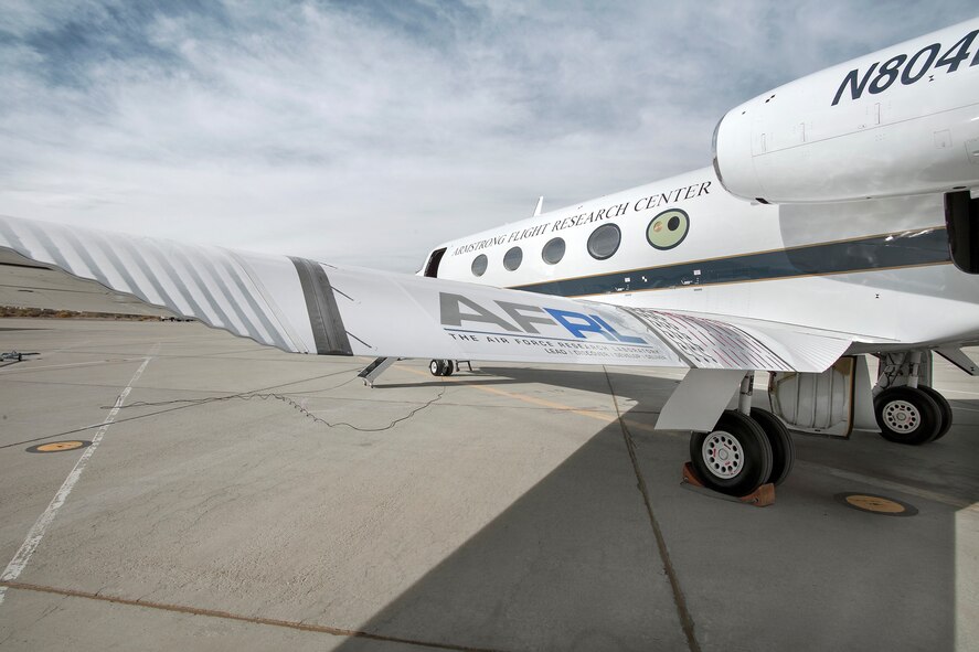 For taxi testing on Oct. 31, 2014, at NASA’s Armstrong Flight Research Center at Edwards Air Force Base, Calif., the Adaptive Compliant Trailing Edge, or ACTE, flap, developed under the Air Force Research Laboratory, was extended to 20 degrees deflection. Flight results will validate whether the seamless design with its advanced lightweight materials can reduce wing structural weight, improve fuel economy and efficiency, and reduce environmental impacts. (NASA photo/Ken Ulbrich)
