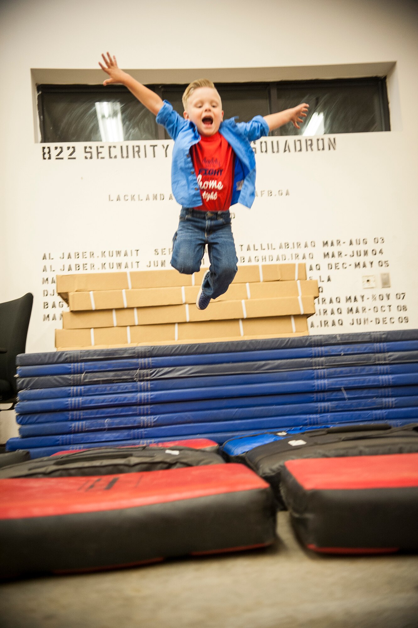 Silas Lanthorn, son of U.S. Air Force Staff Sgt. Lee Lanthorn, shows off his airborne-jump skills in an effort to imitate his dad at Moody Air Force Base, Ga.  Nov. 5, 2014. Silas wants to grow up to be Airborne qualified like his dad who is assigned to the 822nd Base Defense Squadron. (U.S. Air Force photo by Andrea Jenkins/Released)