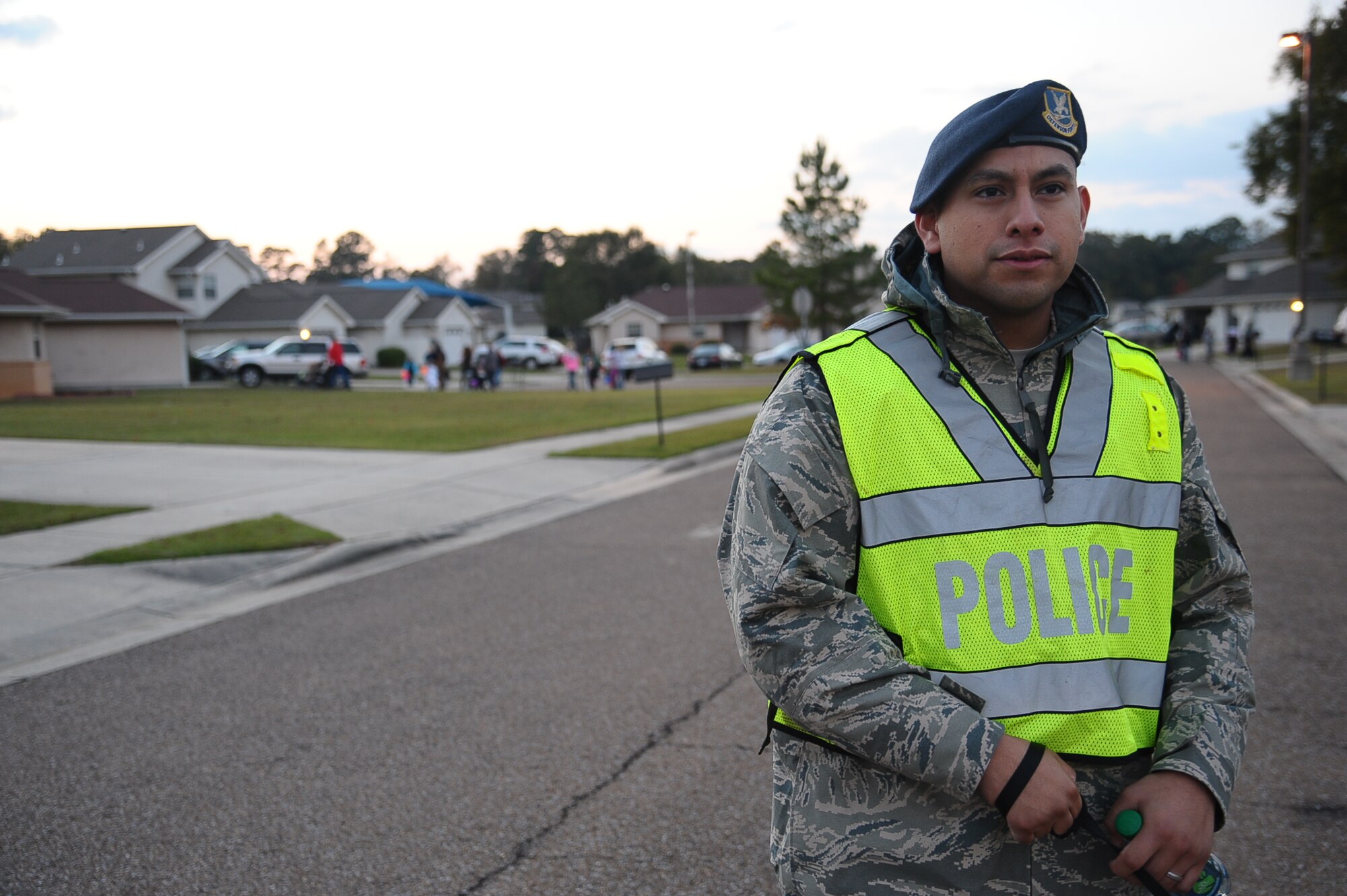 Airman 1st Class Elias Ramirez, 14th Security Forces Squadron Security Specialist, patrols the streets of base housing Oct. 31 on Columbus Air Force Base. Ramirez was just one of over 30 Airmen who volunteered their Halloween evening to ensure the safety of Columbus AFB’s trick-or-treaters. (U.S. Air Force photo/Airman John Day)
