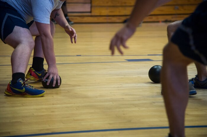 Joint Base Charleston Airmen participate in the monthly fitness challenge Nov. 7, 2014, at the Air Base fitness center on Joint Base Charleston, S.C. The monthly fitness challenge is a 628th Air Base Wing initiative intended to encourage teamwork and camaraderie as part of Comprehensive Airmen Fitness. (U.S. Air Force photo/Airman 1st Class Clayton Cupit)