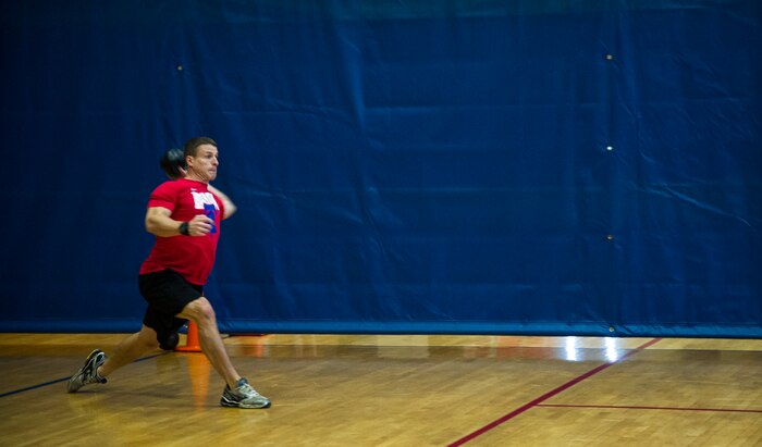 A Joint Base Charleston Airman participates in the monthly fitness challenge Nov. 7, 2014, at the Air Base fitness center on Joint Base Charleston, S.C. The monthly fitness challenge is a 628th Air Base Wing initiative intended to encourage teamwork and camaraderie as part of Comprehensive Airmen Fitness. (U.S. Air Force photo/Airman 1st Class Clayton Cupit)