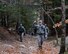 An Airman from the 157th Security Forces Squadron leads other Defenders during fire team movements on Mount Major near Alton Bay, N.H. on Nov. 2, 2014. The Airmen are from the 157 SFS at Pease Air National Guard Base, N.H.  (U.S. Air National Guard photo/Staff Sgt. Curtis J. Lenz)