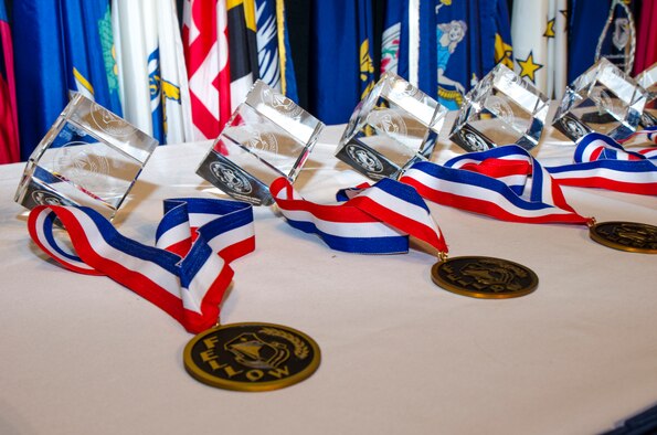 Cubes and medallions are prepared for presentation to the 2014 Air Force Research Laboratory Fellows Oct. 30 at the National Museum of the U.S. Air Force, Wright-Patterson Air Force Base, Ohio.  The Fellows award is the Laboratory's highest honor and selection represents the top 0.2 percent of all professional technical personnel. Each Fellow receives a two-year research grant of $300,000. (U.S. Air Force photo/Mikee Huber) 