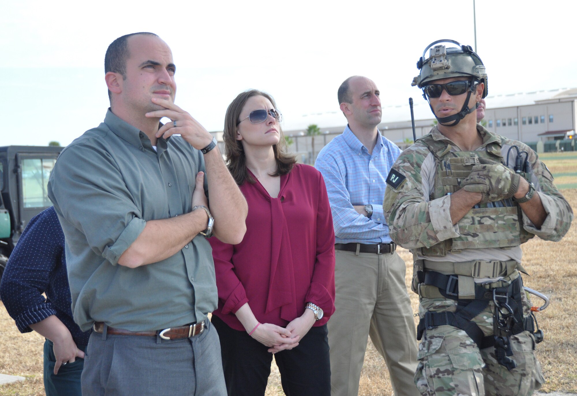 A U.S. Air Force Reserve Pararescueman describes the mission of the 920th Rescue Wing, Patrick AFB to Elizabeth Brown and James Zumwalt, congressional staffers from the state of Florida. Both staffers were part of a tour group visiting Air Force Reserve wings throughout the state of Florida, Nov 5-8. (U.S. Air Force Photo/Capt Joe Simms)